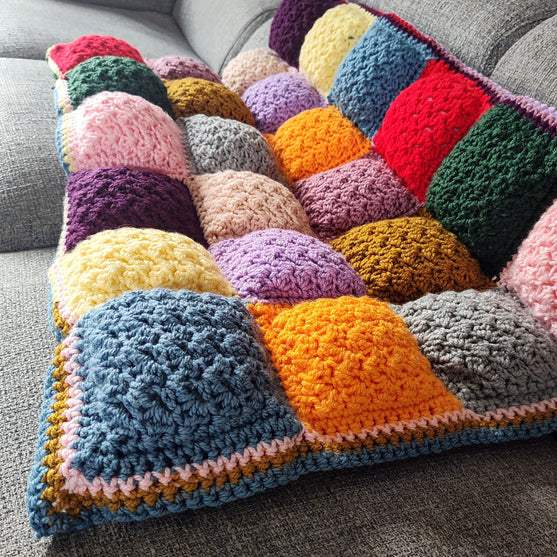 Soft Squares - Gefütterter Überwurf
5