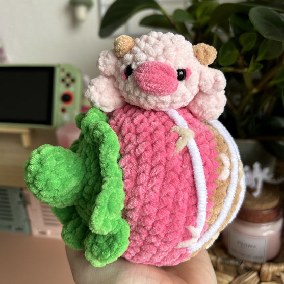 Kuh auf einer Erdbeere
2