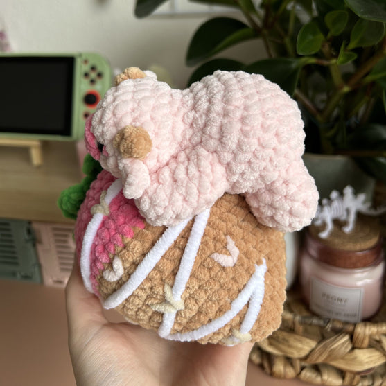 Kuh auf einer Erdbeere
3