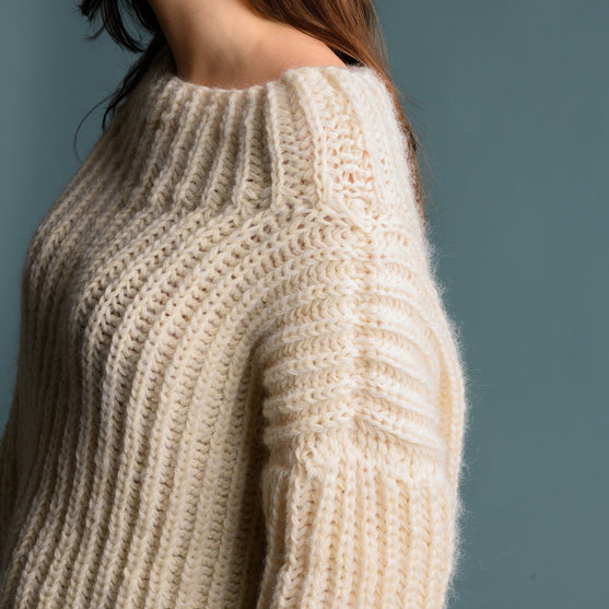 Naomi - Patentsweater
7