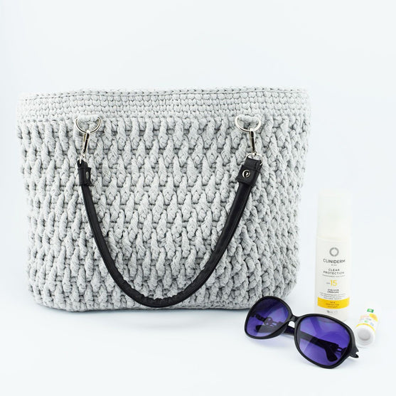 Ribbon Tasche mit Henkel
2