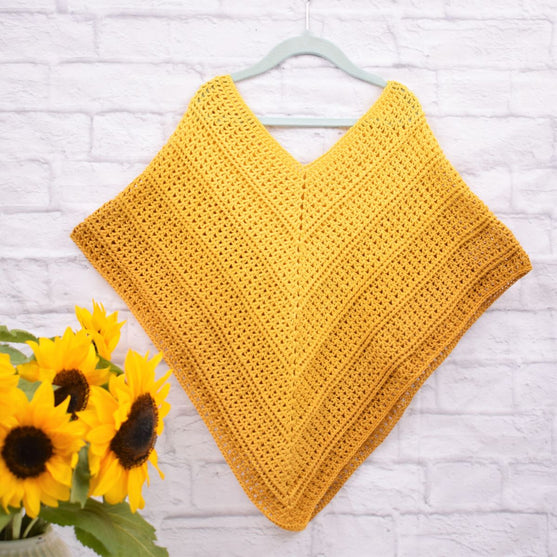 

Timeless Kinder Poncho – Sultan
3