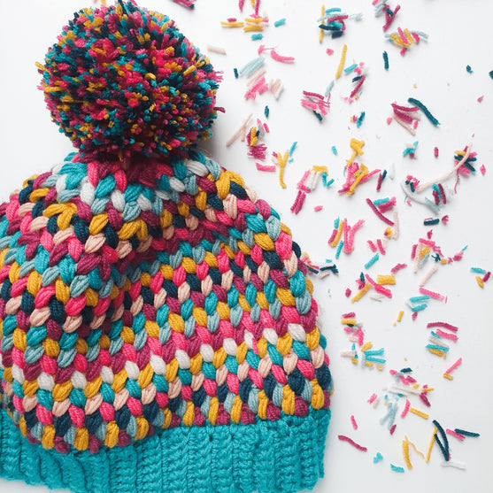 

Mütze mit Flechtmuster
1