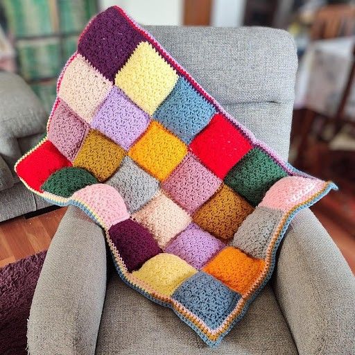 

Soft Squares - Gefütterter Überwurf
1