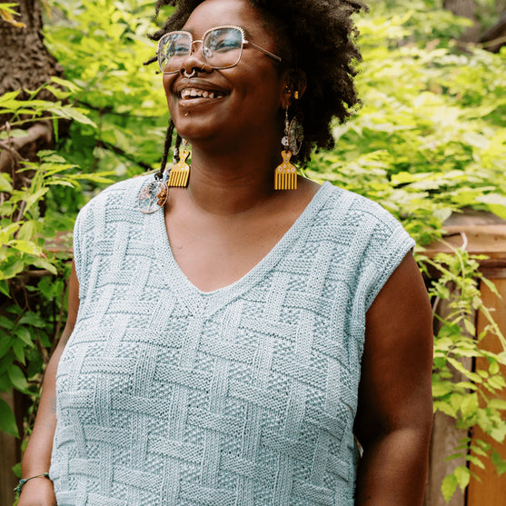 

Calme Top - Ärmelloses Top im Korbmuster
4