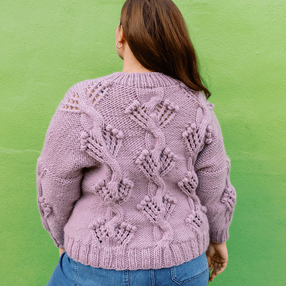 

Apotheosis - Pullover mit Zöpfen und Noppen
4