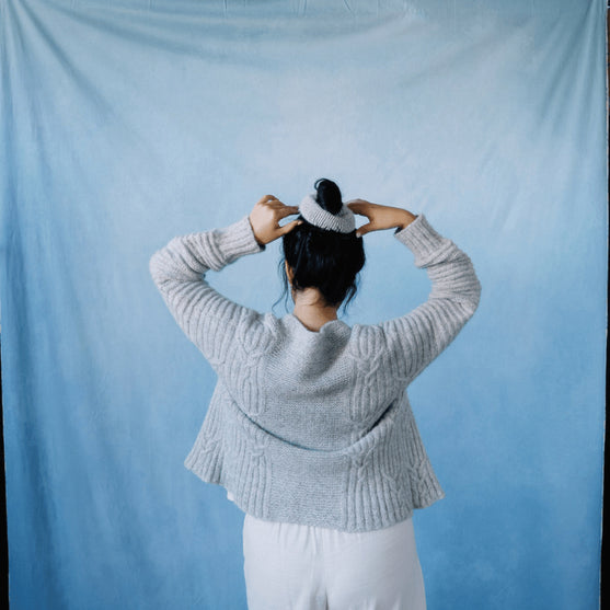 

Cloudbusting - Cardigan mit Zopfmuster
2