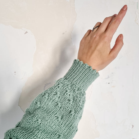 

Dandelion Blowing - Strickjacke
6