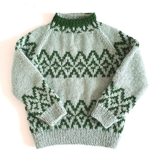 

All Round - Kinder-Weihnachtspullover
1
