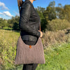 

Amelia - Schultertasche
5