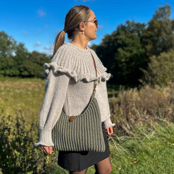 

Amelia - Schultertasche
4