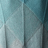 

Emerald - Domino Schal
4