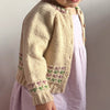 

Romi - Kinder-Cardigan
2