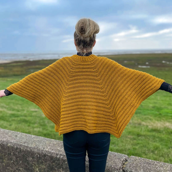 

Kind Embrace - Umhang
3